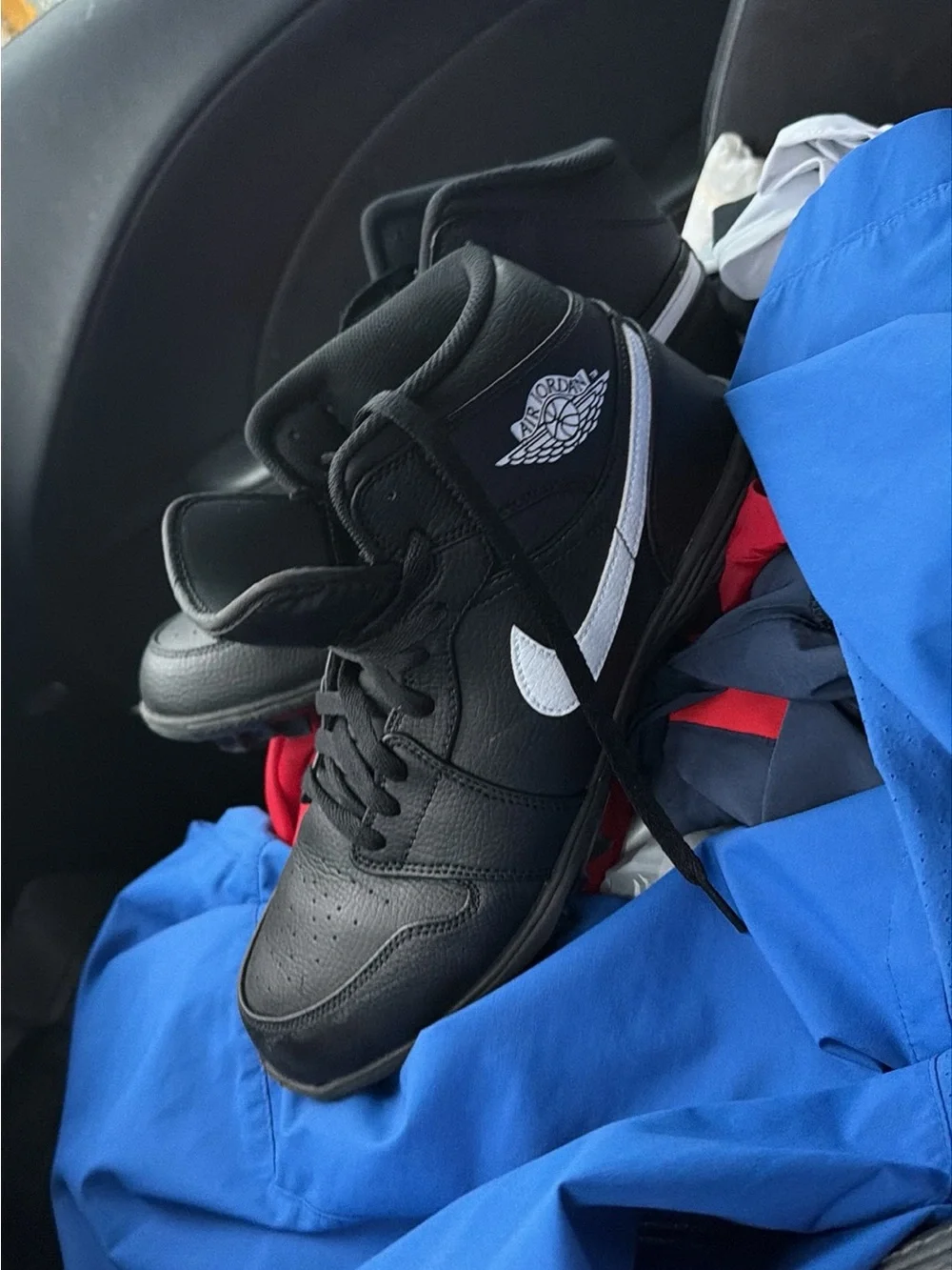 Jordan Black and White Mid-Top Sneakers